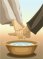 Jesus washing his disciples feet.